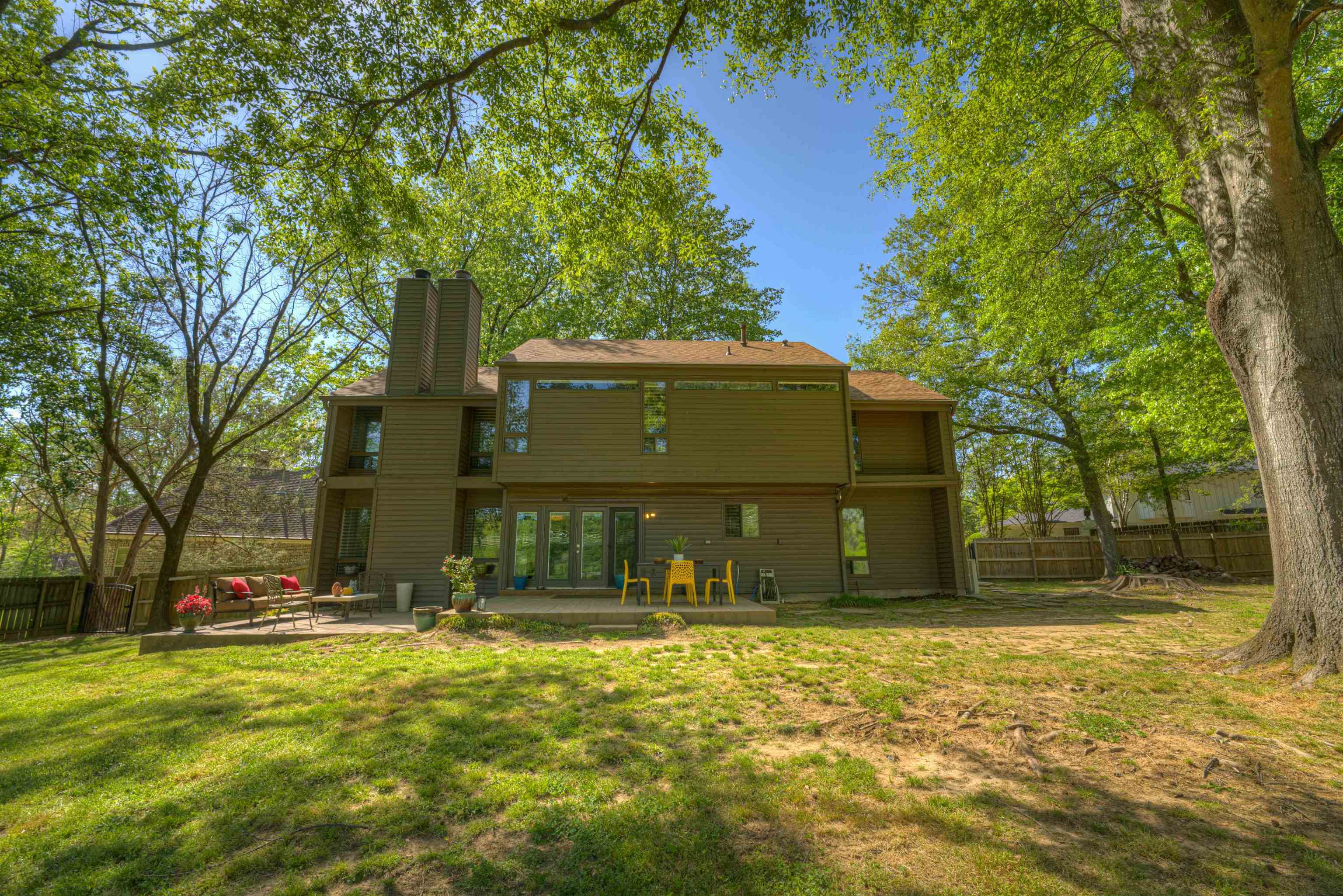 6921 Tangleberry Cove Memphis, TN 38119 - Photo 33 of 39 a front view of a house with a yard