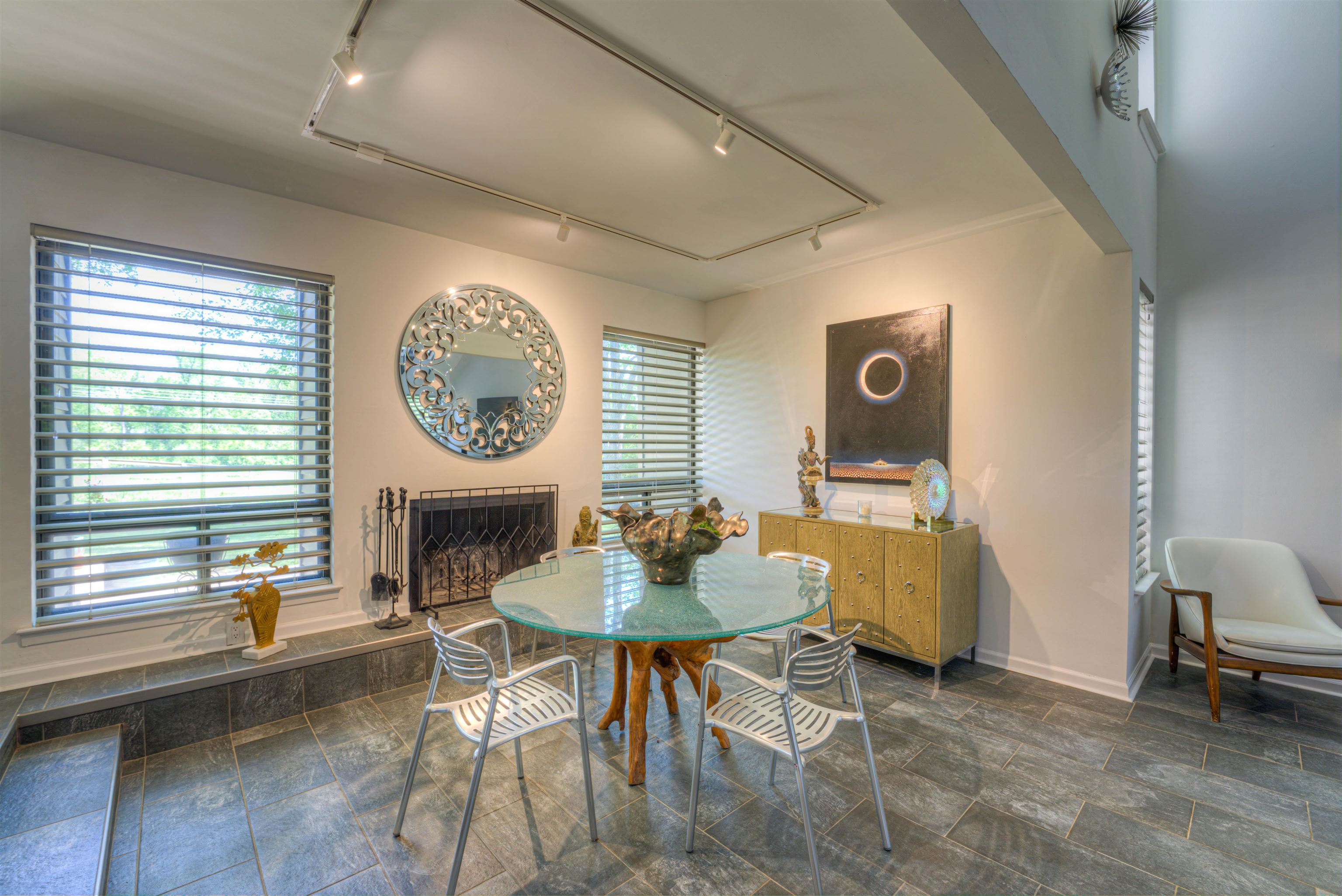 6921 Tangleberry Cove Memphis, TN 38119 - Photo 5 of 39 a living room with furniture a clock and a window