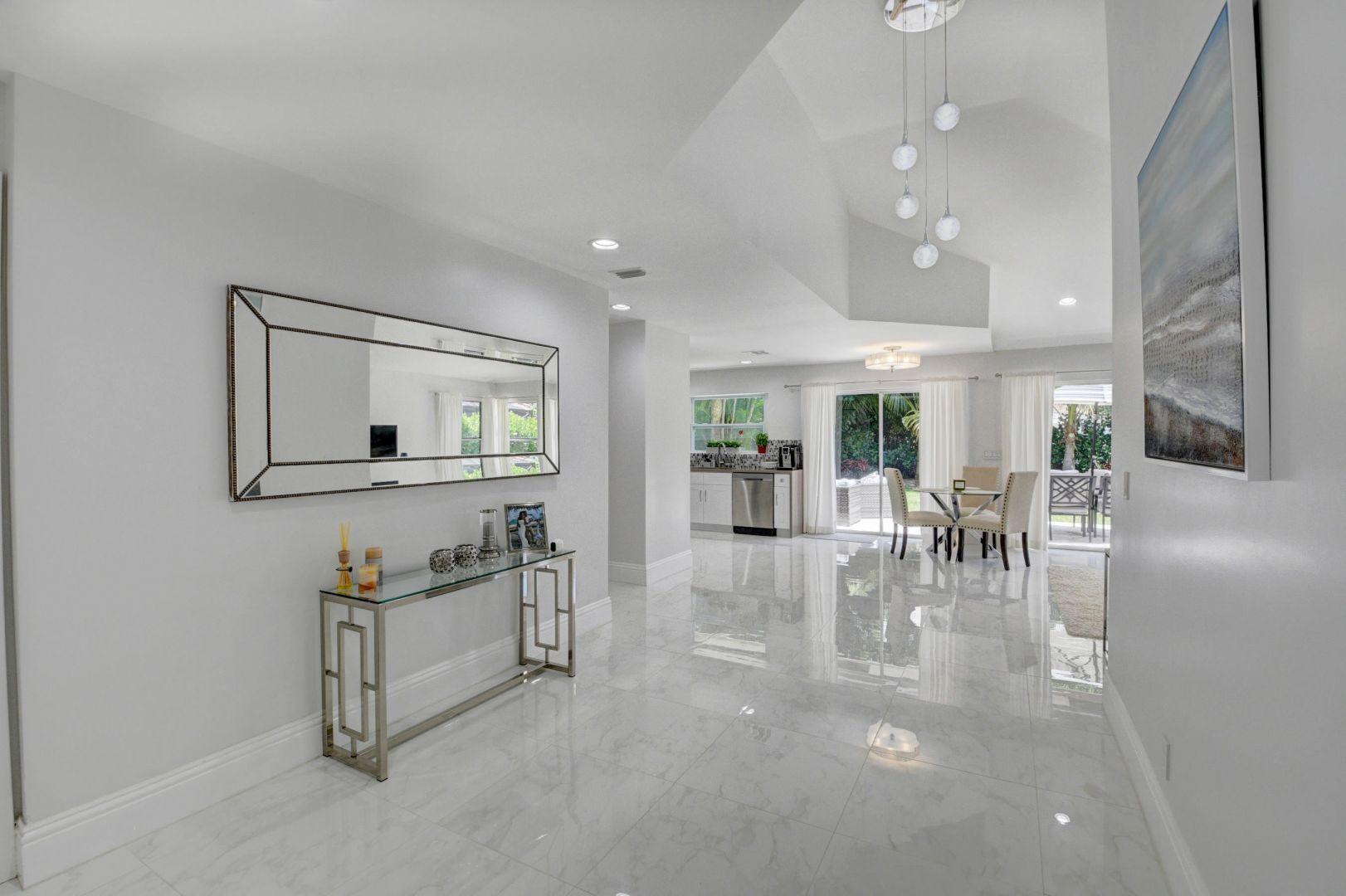 2157 Northwest 52nd Street Boca Raton, FL 33496 - Photo 3 of 27 a view of a dining room with furniture