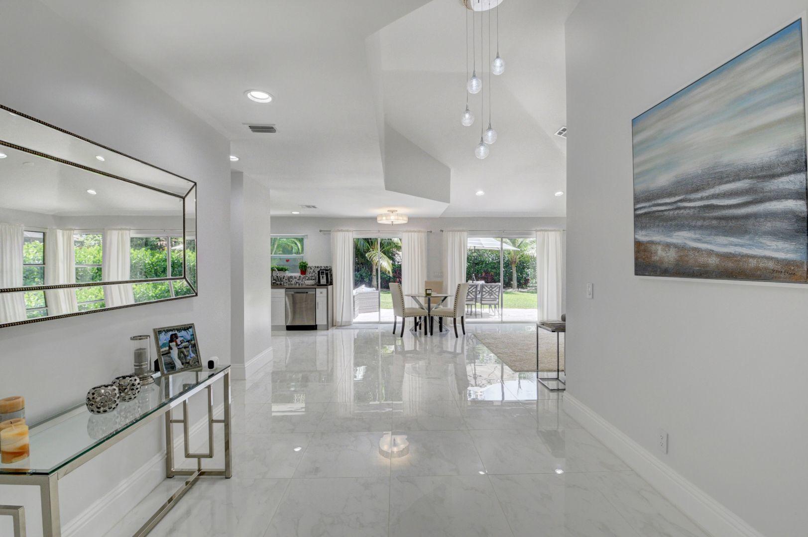 2157 Northwest 52nd Street Boca Raton, FL 33496 - Photo 4 of 27 a view of a dining area with furniture window and outside view