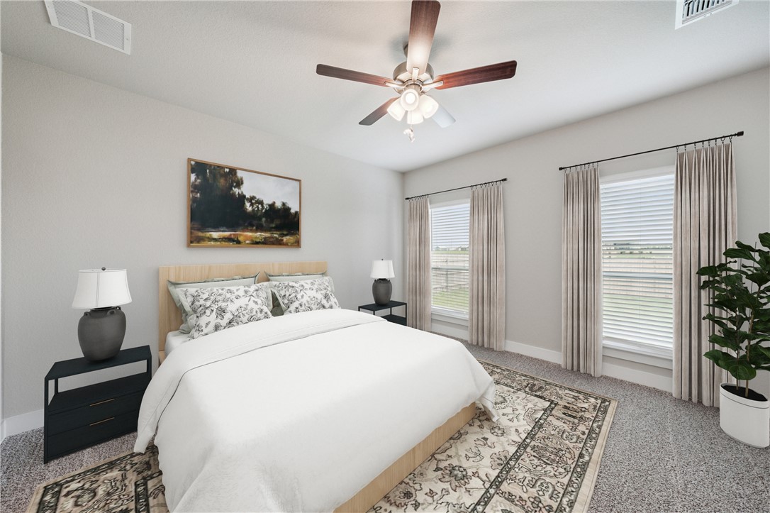 6408 Raleigh Loop College Station, TX 77845 - Photo 6 of 12 Bedroom with light carpet and a ceiling fan