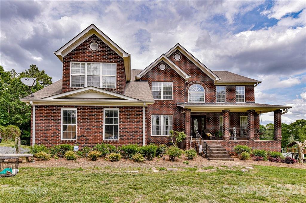 350 Curlee Road Polkton, NC 28135 - Photo 2 of 44 front view of a house with a yard