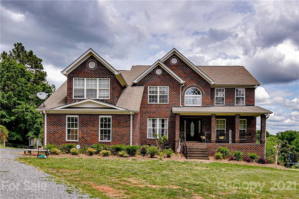 350 Curlee Road Polkton, NC 28135 - Photo 3 of 44 front view of a house with a yard