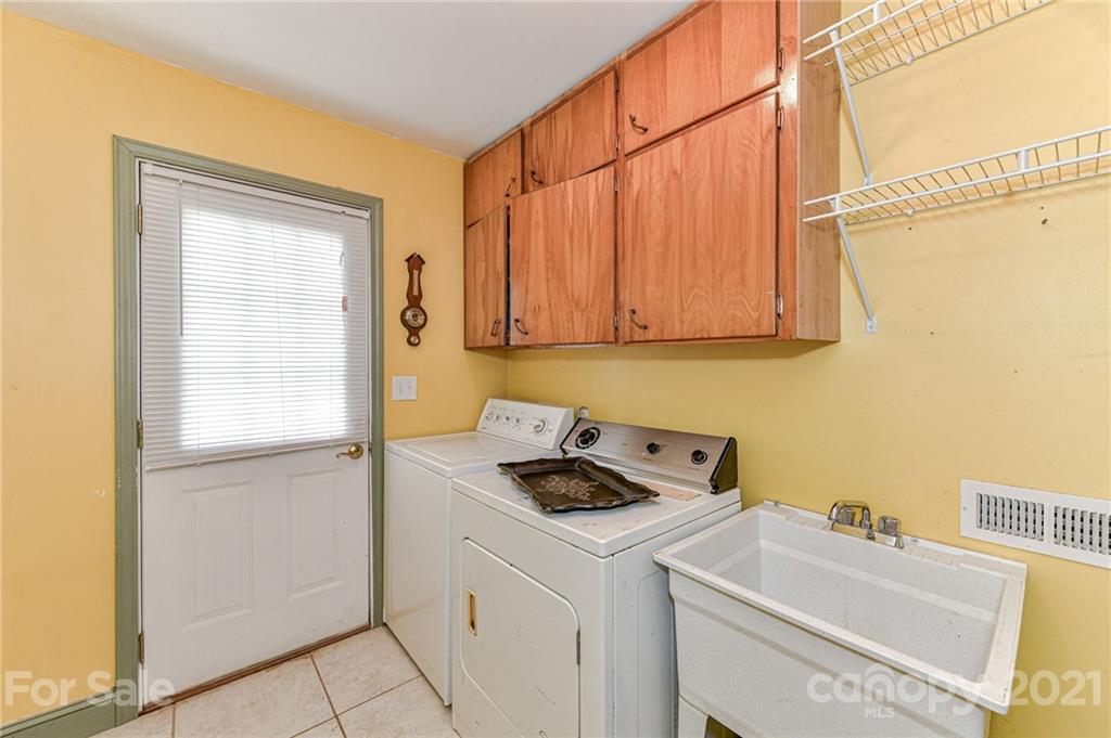 350 Curlee Road Polkton, NC 28135 - Photo 22 of 44 a utility room with dryer and washer
