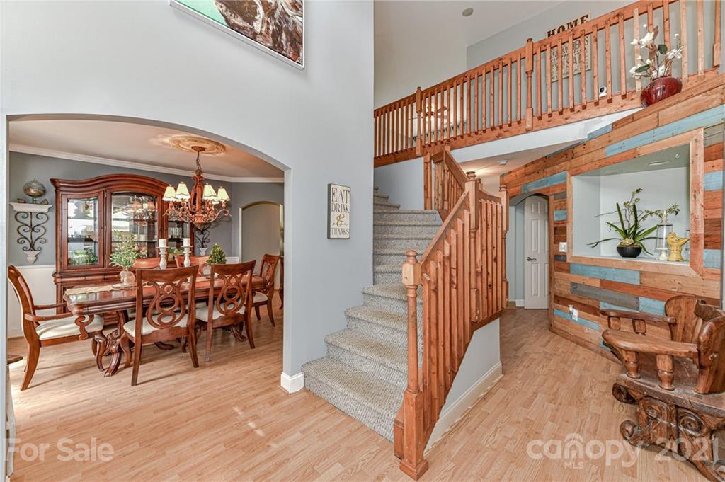 350 Curlee Road Polkton, NC 28135 - Photo 23 of 44 a view of an entryway wooden floor and dining room