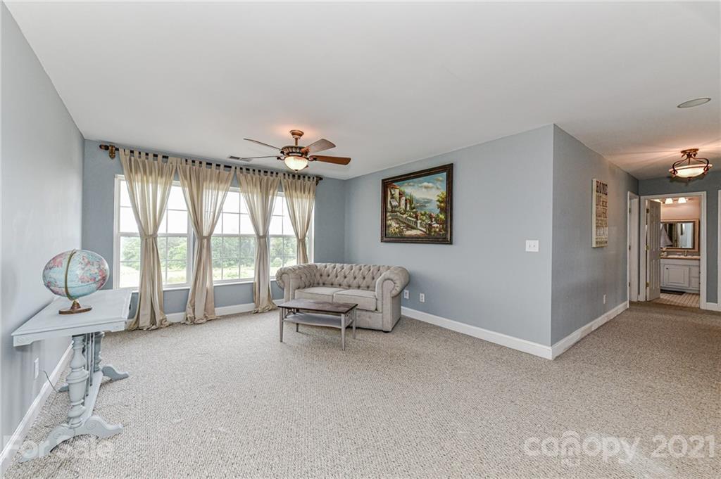 350 Curlee Road Polkton, NC 28135 - Photo 24 of 44 a living room with furniture and a large window