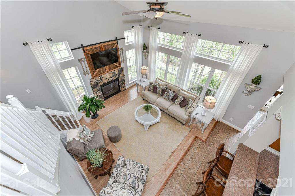 350 Curlee Road Polkton, NC 28135 - Photo 25 of 44 a living room with furniture fireplace and flat screen tv