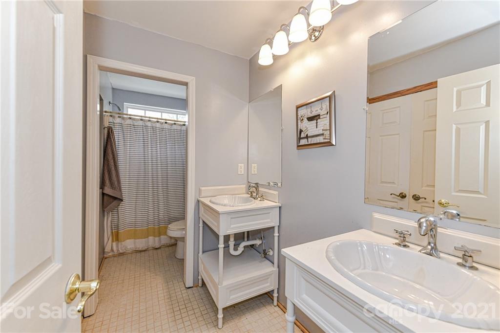 350 Curlee Road Polkton, NC 28135 - Photo 28 of 44 a en suite spacious bathroom with a double vanity sink and a mirror