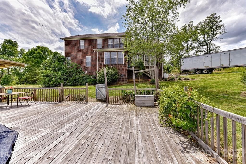 350 Curlee Road Polkton, NC 28135 - Photo 38 of 44 a view of a house with backyard and sitting area