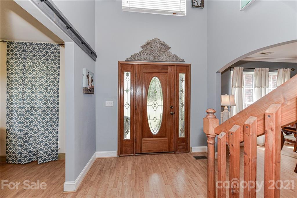 350 Curlee Road Polkton, NC 28135 - Photo 7 of 44 a view of a entryway door with wooden floor