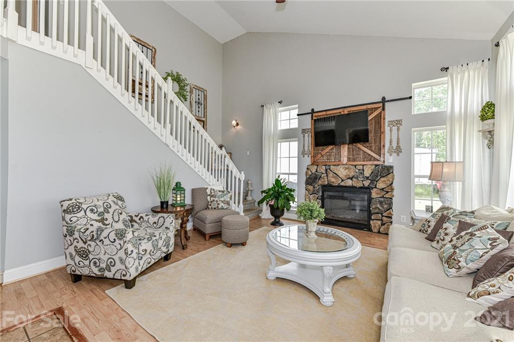 350 Curlee Road Polkton, NC 28135 - Photo 10 of 44 a living room with furniture and a large window