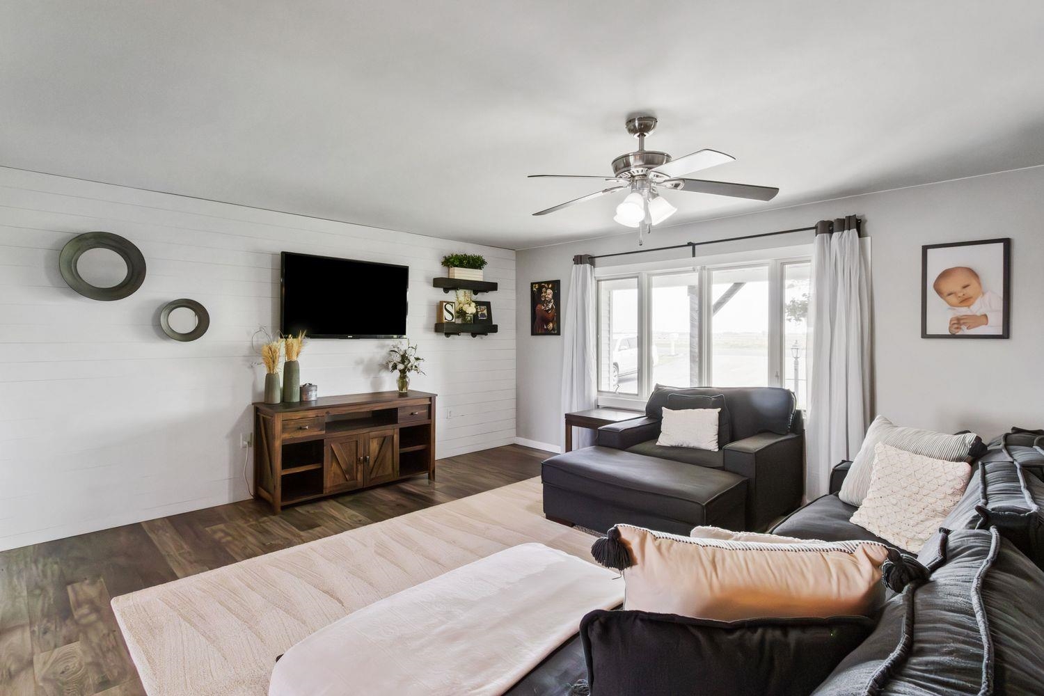 29124 Plautz Road Rock Falls, IL 61071 - Photo 6 of 45 a living room with furniture and a flat screen tv