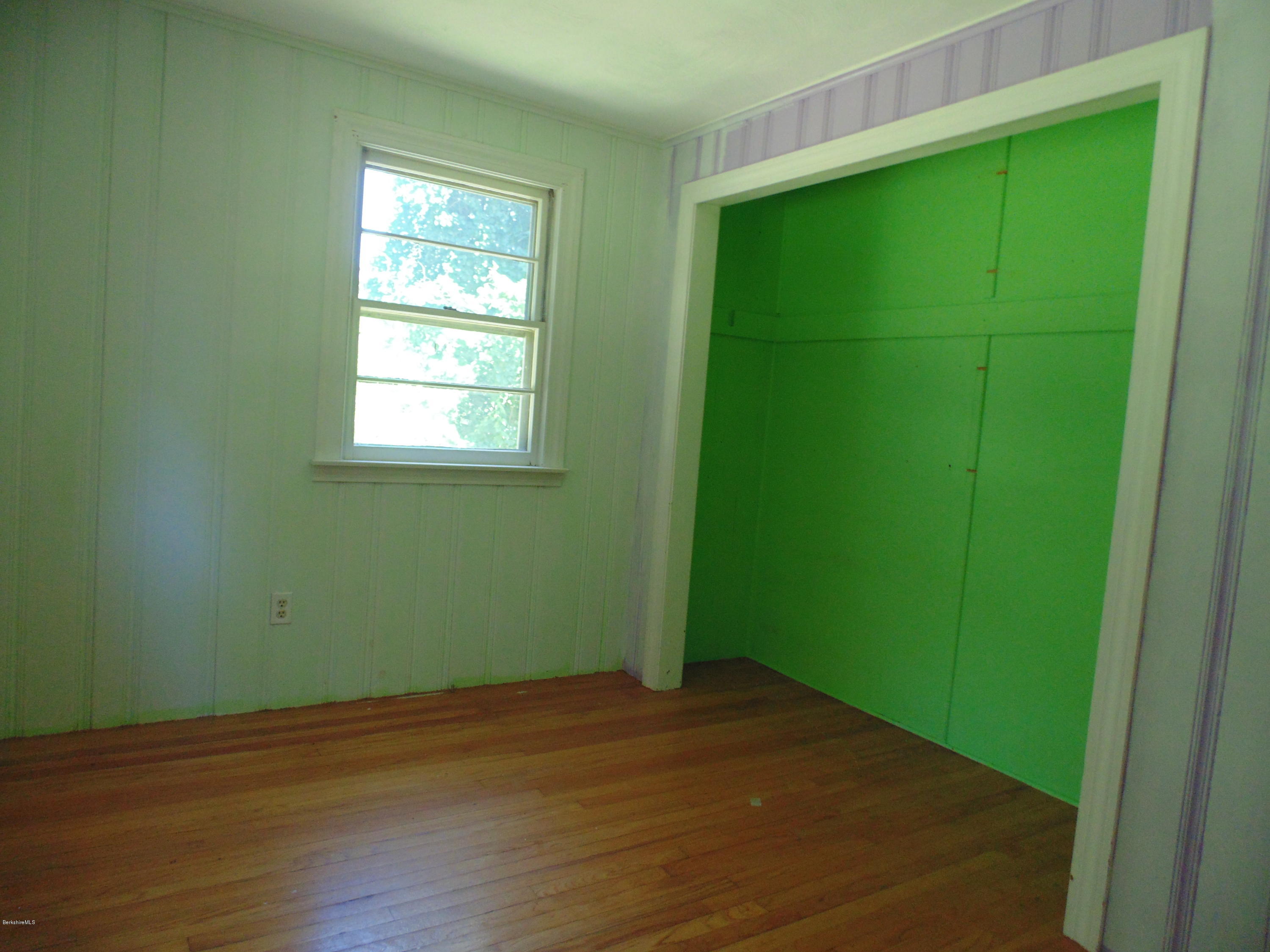 390 Montgomery Road Westfield, MA 01085 - Photo 17 of 29 an empty room with closet and window