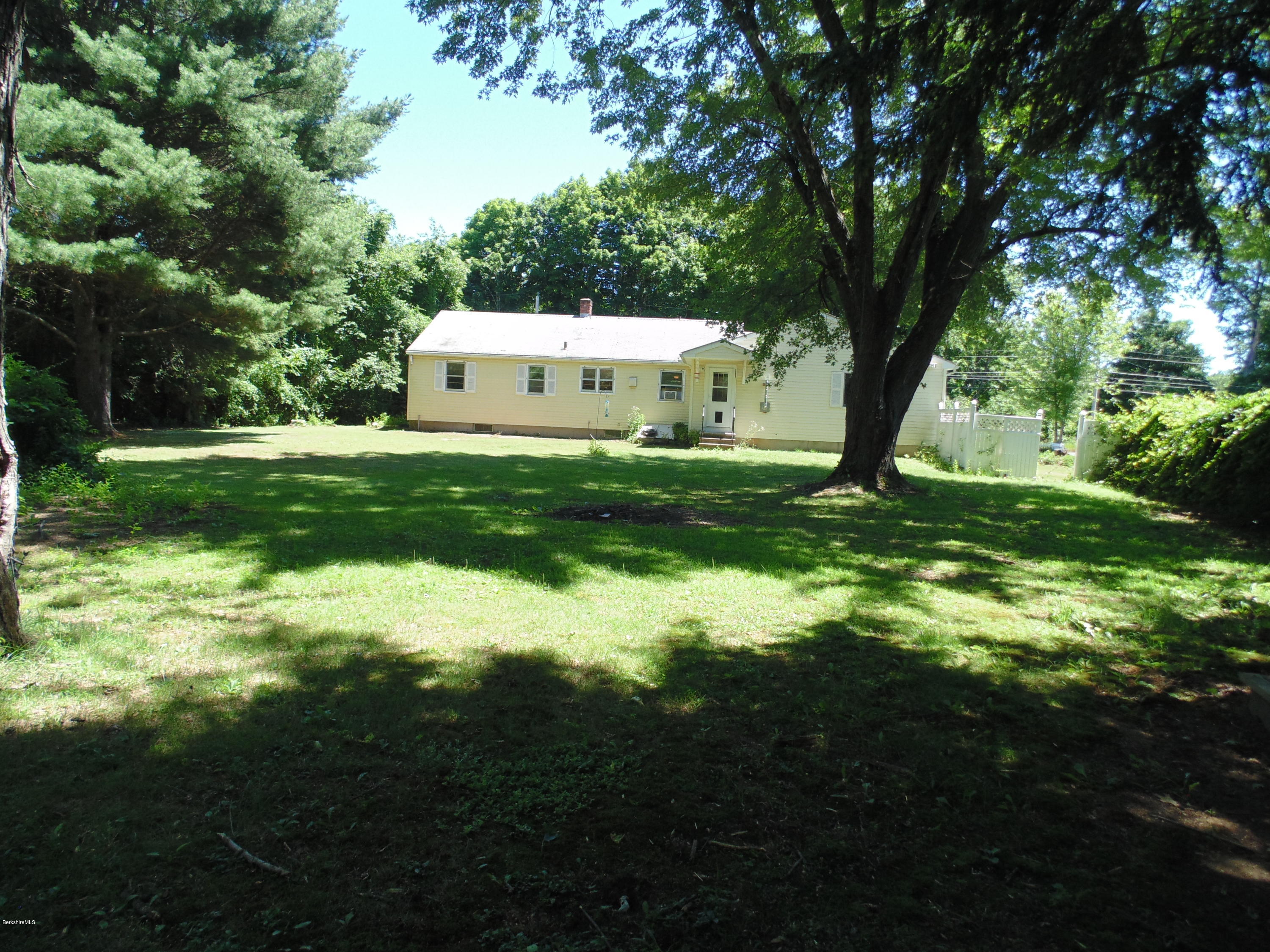 390 Montgomery Road Westfield, MA 01085 - Photo 26 of 29 a view of a house with a yard