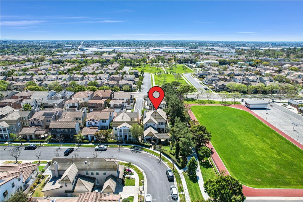 2094 Ward Street Fullerton, CA 92833 - Photo 56 of 66 an aerial view of residential houses with outdoor space and swimming pool