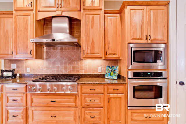 119 Sandy Ford Road Fairhope, AL 36532 - Photo 4 of 23 Custom cabinets in kitchen