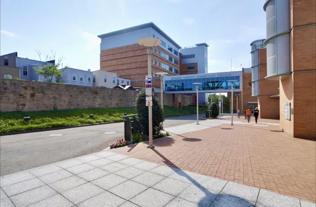 a view of a hallway with a living room