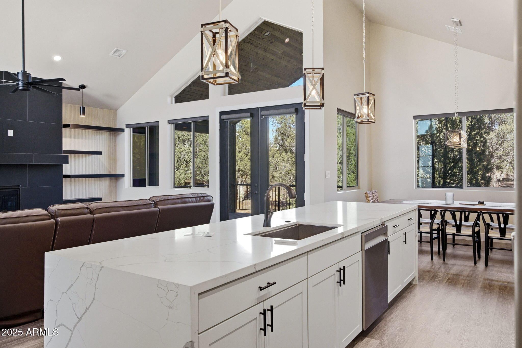 2701 North Eagle View Circle Show Low, AZ 85901 - Photo 11 of 49 a large kitchen with kitchen island a large window in it