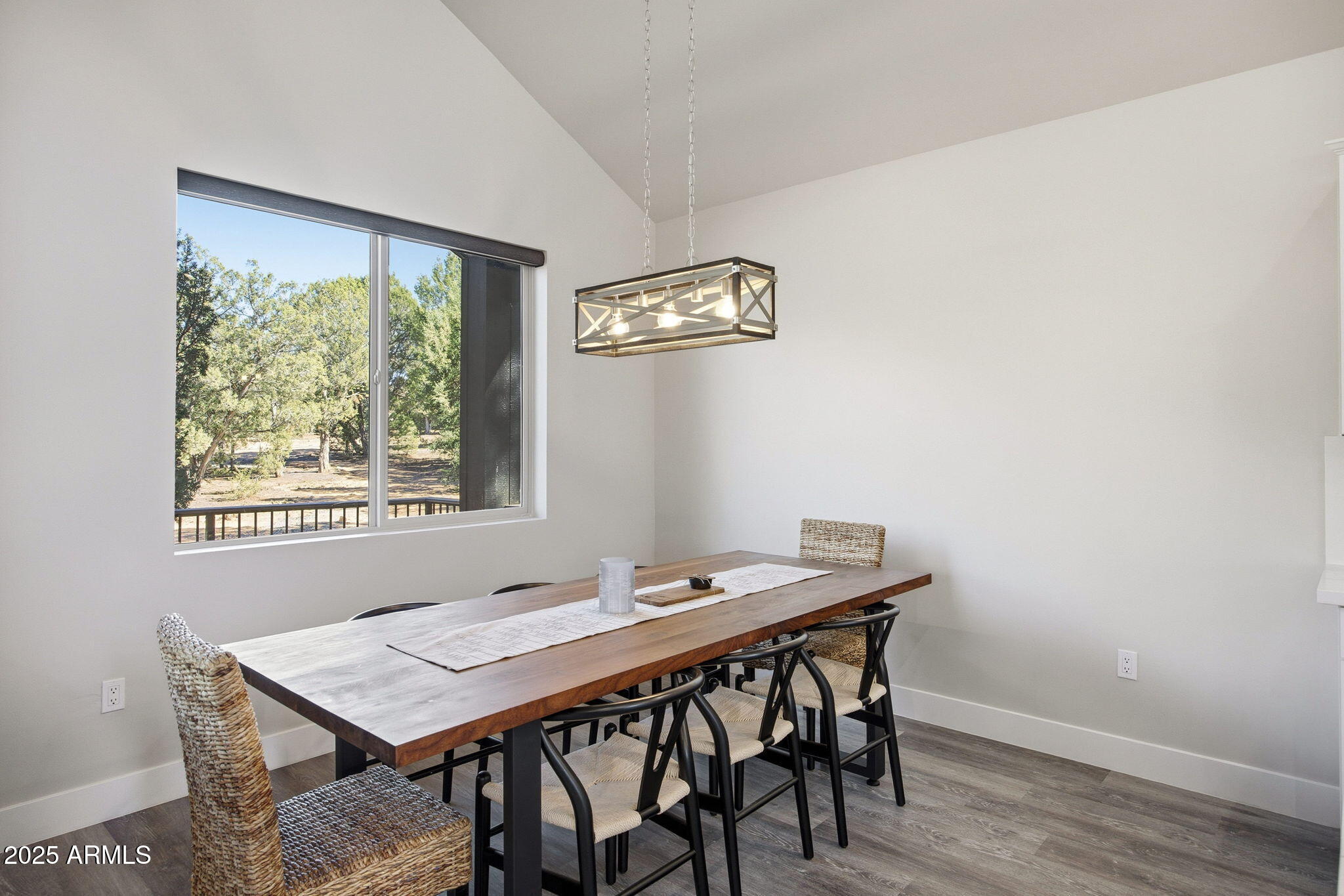 2701 North Eagle View Circle Show Low, AZ 85901 - Photo 12 of 49 a view of a dining room with furniture and a window