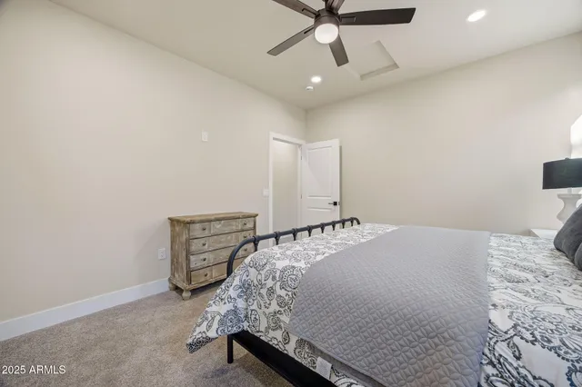 a bed room with a bed and a window