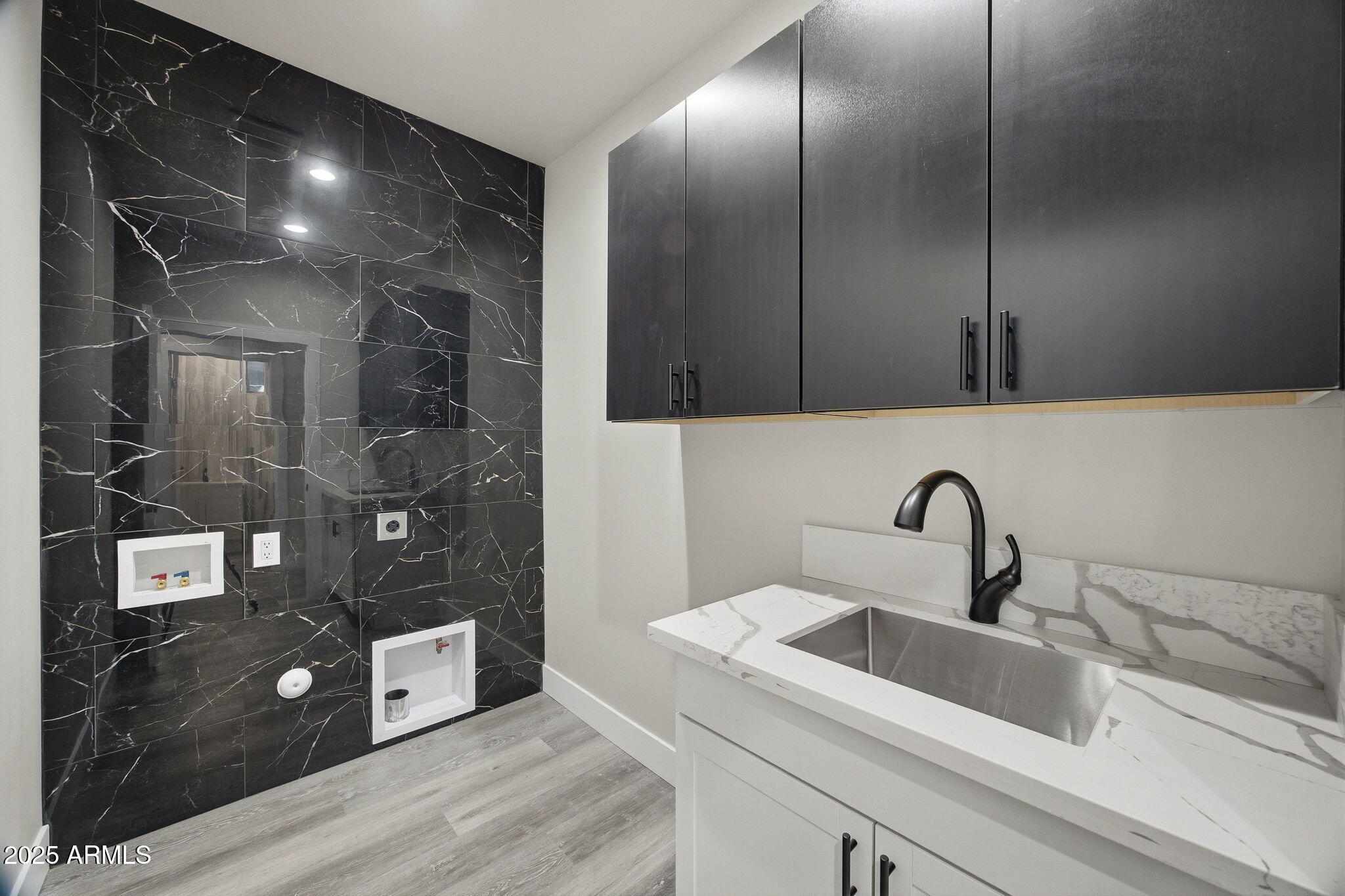 2701 North Eagle View Circle Show Low, AZ 85901 - Photo 25 of 49 a close view of a sink a counter space and utility room