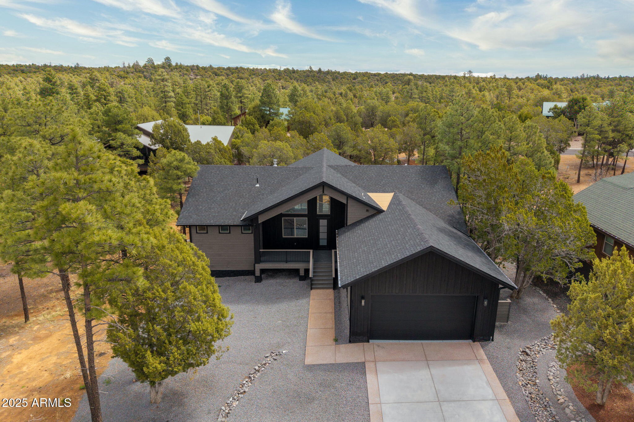 2701 North Eagle View Circle Show Low, AZ 85901 - Photo 28 of 49 a picture of a house with a yard
