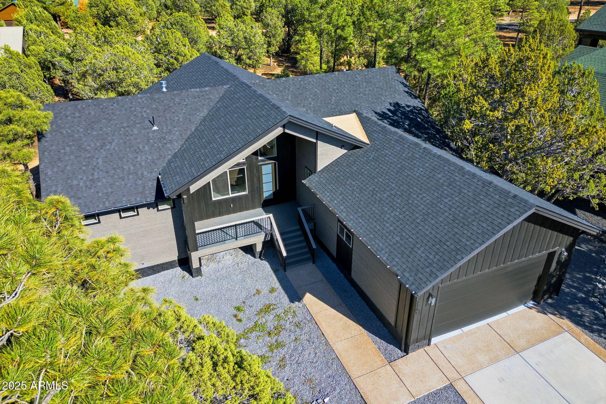 2701 North Eagle View Circle Show Low, AZ 85901 - Photo 31 of 49 a view of house with yard and trees in the background