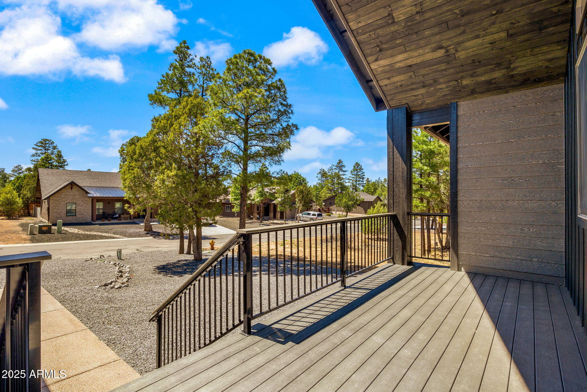 2701 North Eagle View Circle Show Low, AZ 85901 - Photo 38 of 49 a view of a balcony with wooden floor