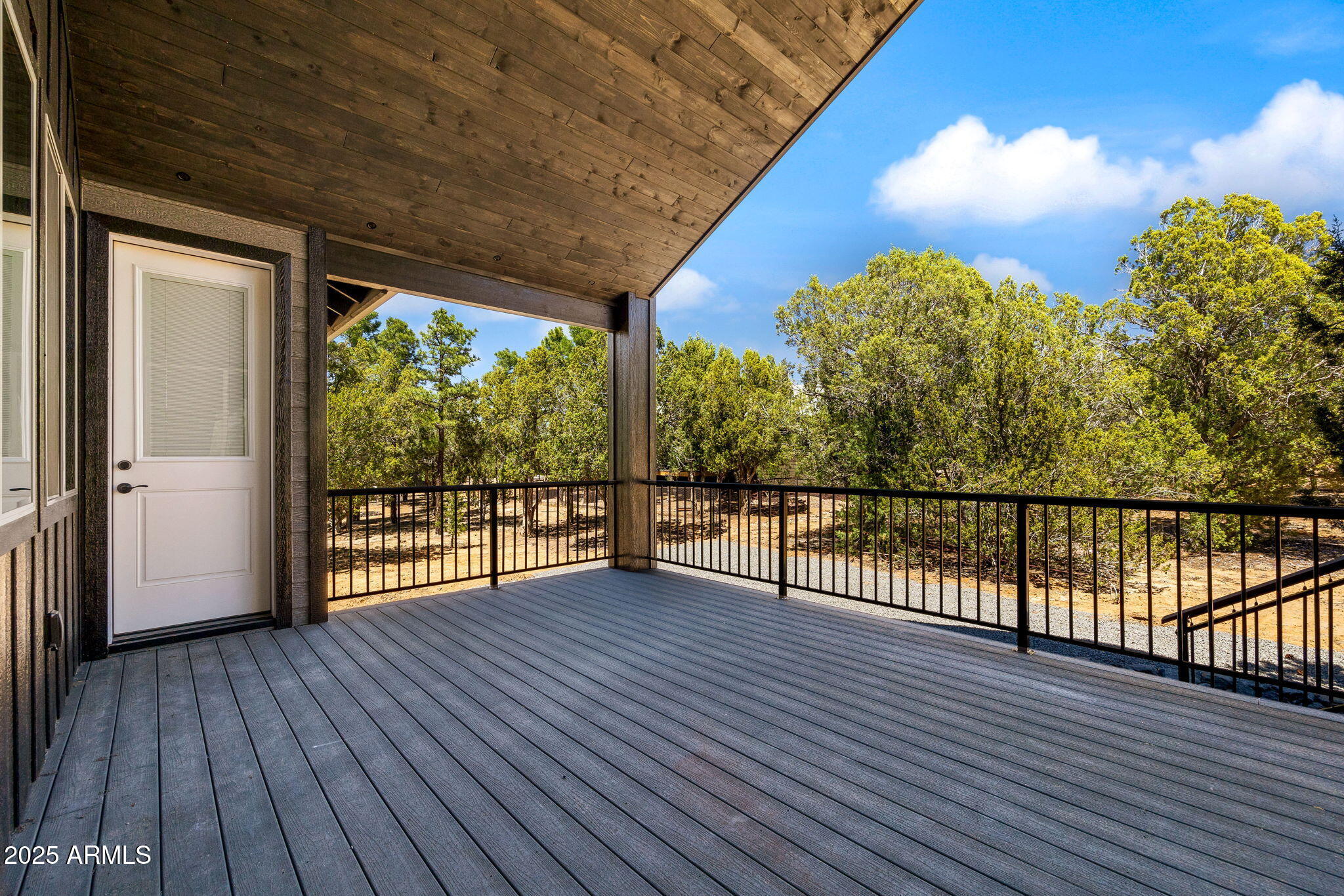 2701 North Eagle View Circle Show Low, AZ 85901 - Photo 39 of 49 a view of balcony with wooden floor