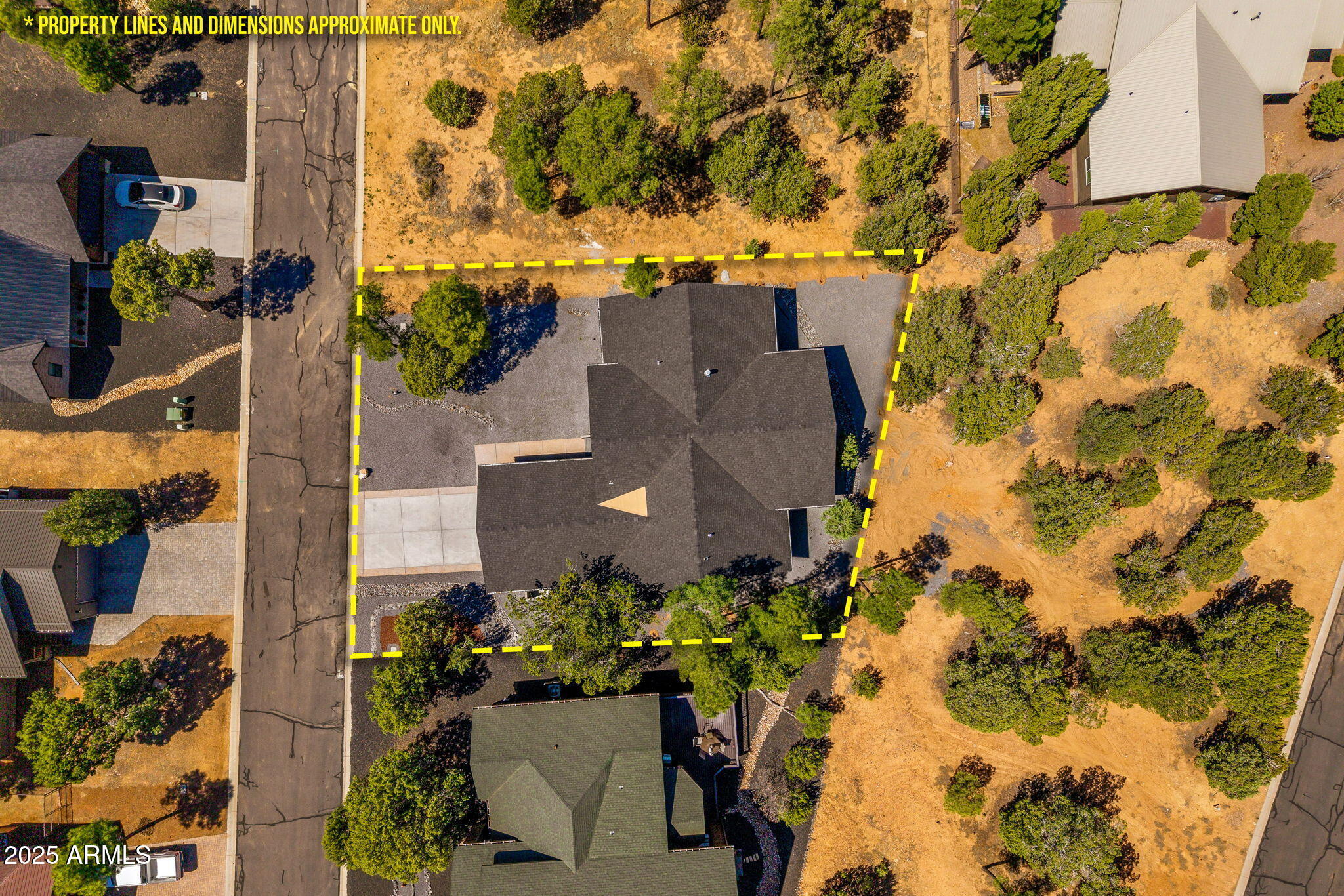 2701 North Eagle View Circle Show Low, AZ 85901 - Photo 43 of 49 aerial view of a house with a yard and sitting area