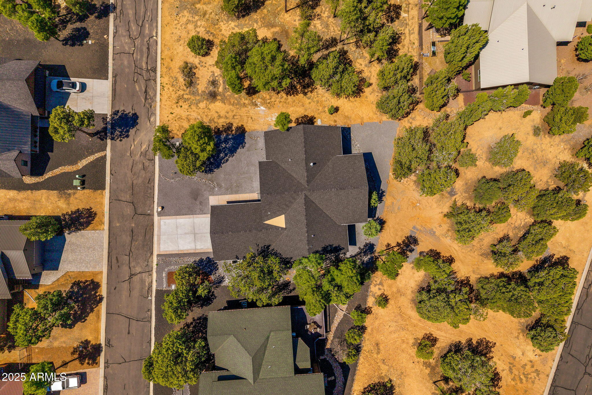 2701 North Eagle View Circle Show Low, AZ 85901 - Photo 45 of 49 aerial view of a house with a yard and sitting area