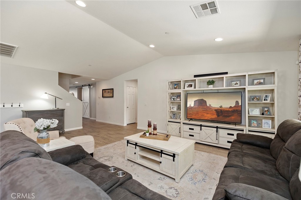 33185 Big Range Drive Winchester, CA 92596 - Photo 11 of 54 a living room with furniture and a flat screen tv