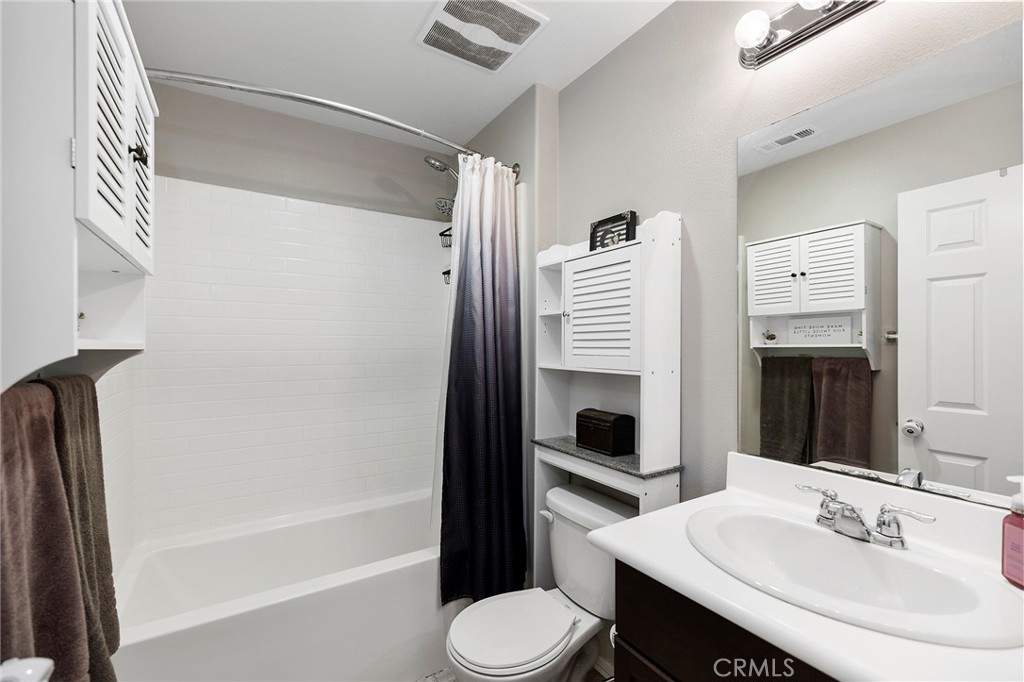 33185 Big Range Drive Winchester, CA 92596 - Photo 25 of 54 a bathroom with a sink toilet and shower