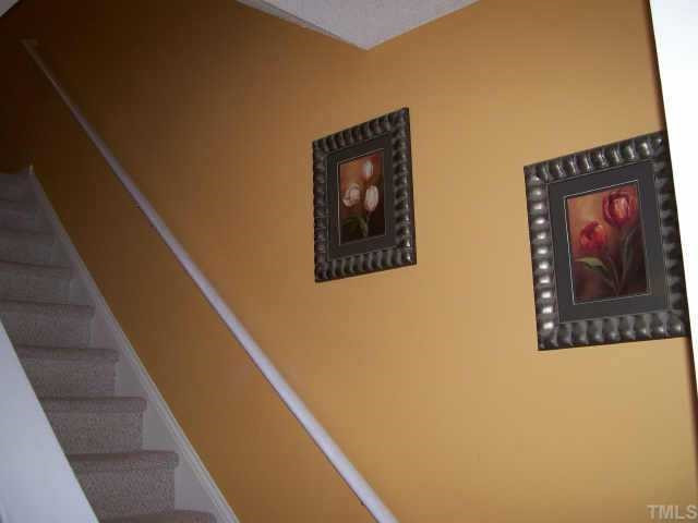 3404 Sosa Road Raleigh, NC 27610 - Photo 7 of 10 Upstairs hallway has plenty of room for pictures/tapestry hanging/painting..great focal wall Other
