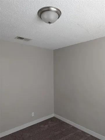 a view of a window in an empty room