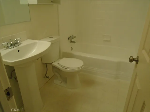 a bathroom with a sink and a toilet