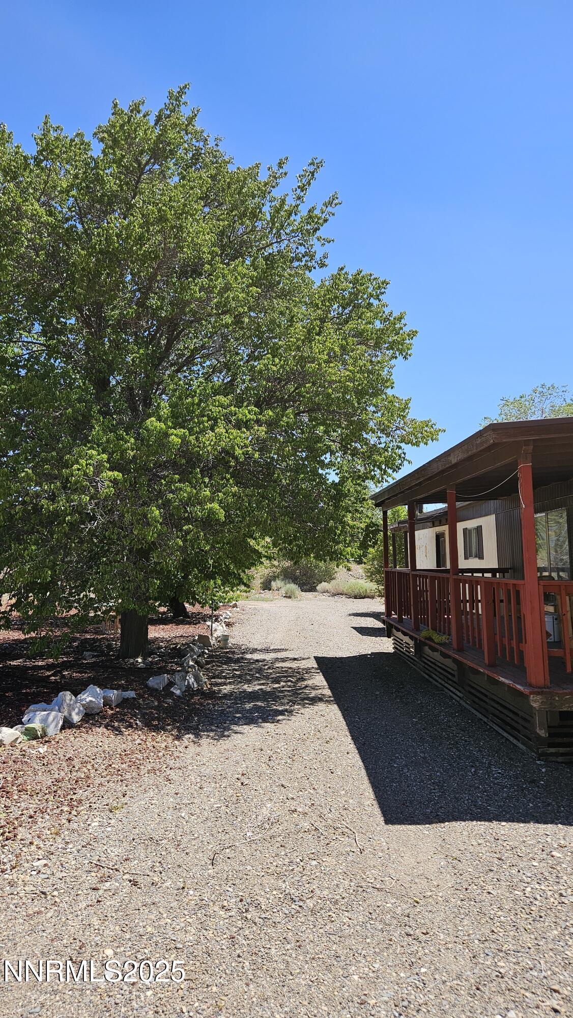 3791 Granite Way Topaz Ranch Estates, NV 89444 - Photo 27 of 39 a view of a house with a yard