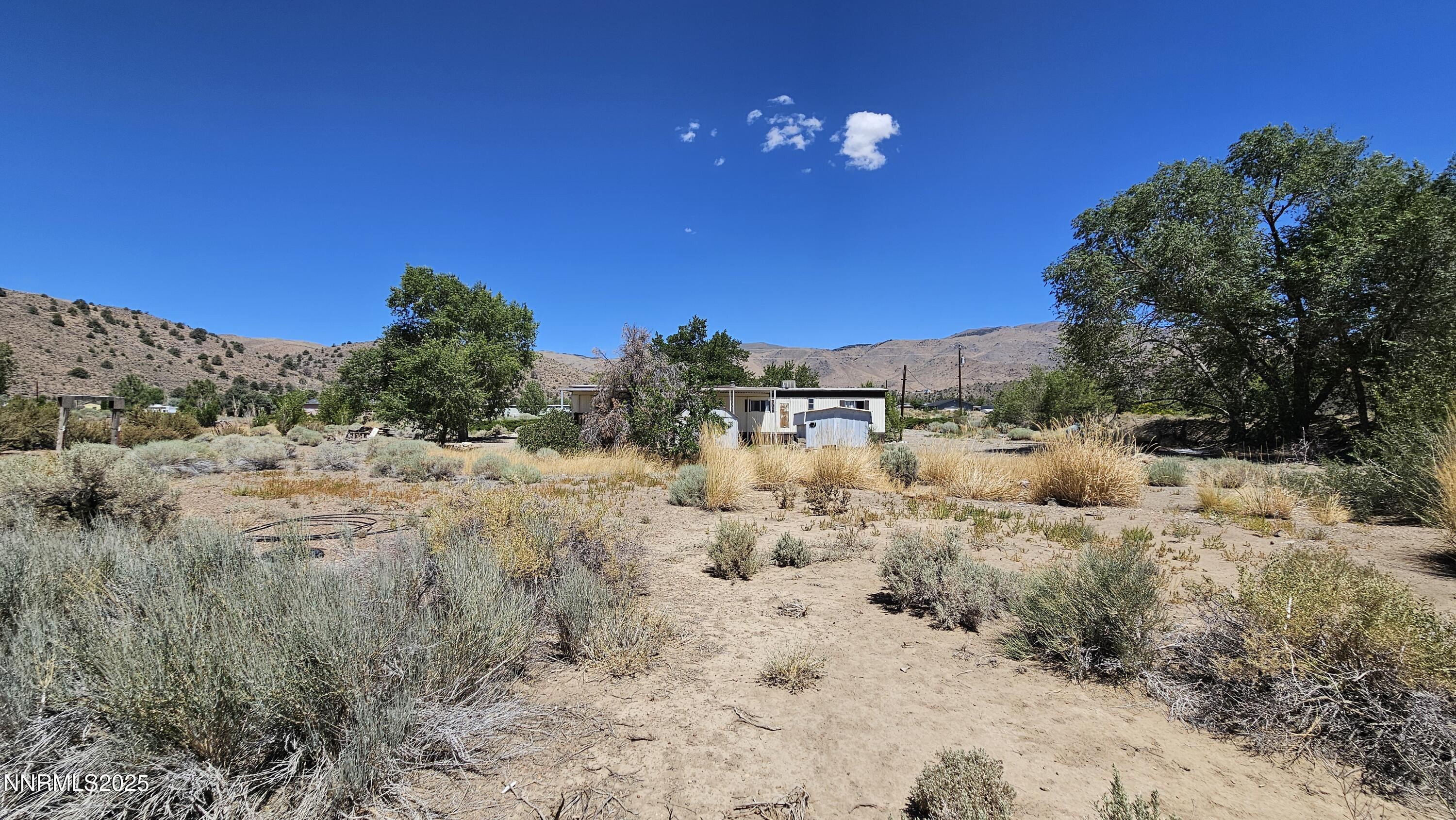 3791 Granite Way Topaz Ranch Estates, NV 89444 - Photo 30 of 39 a view of a beach with a yard