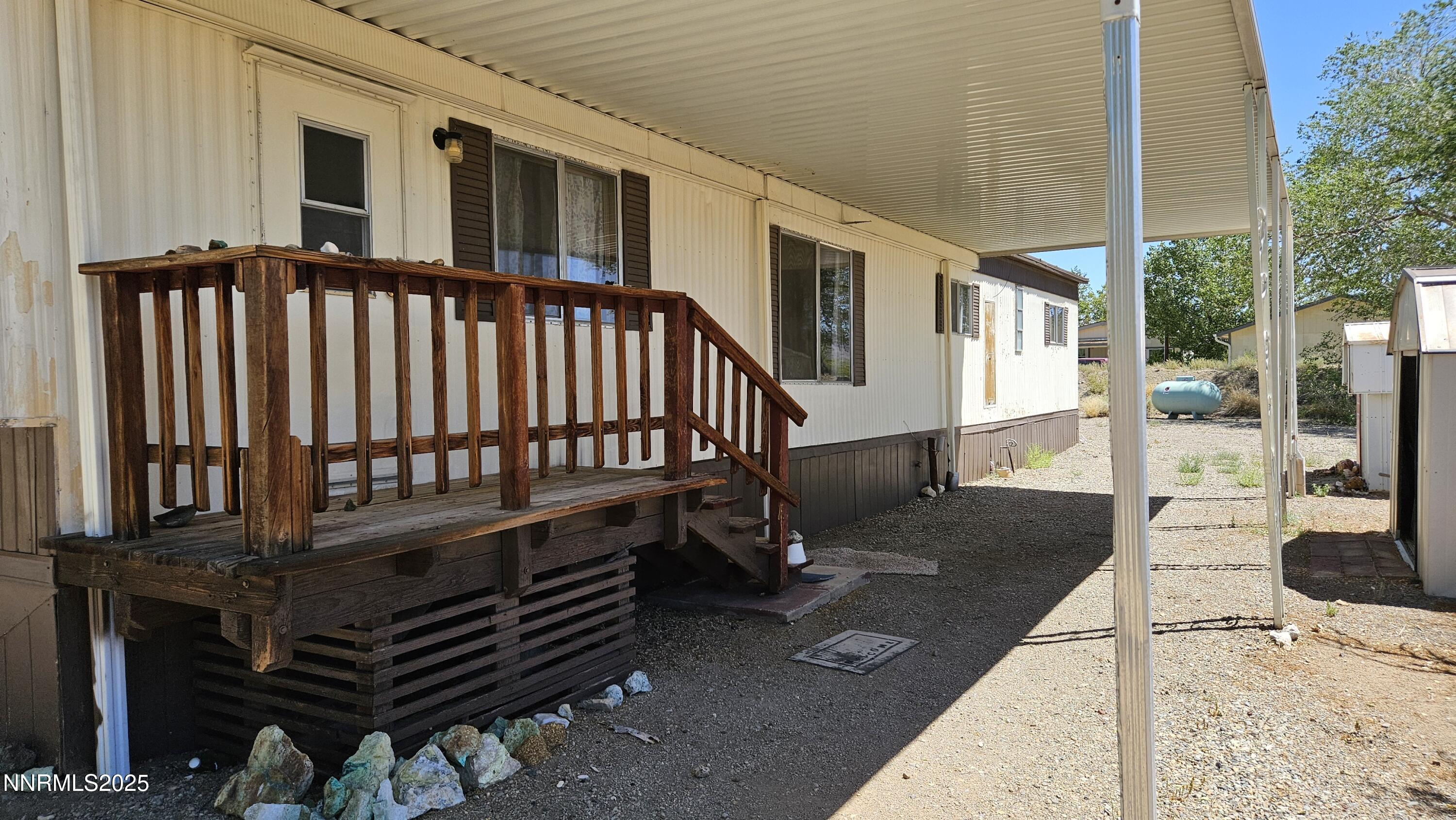 3791 Granite Way Topaz Ranch Estates, NV 89444 - Photo 35 of 39 a view of a patio with a table and chairs
