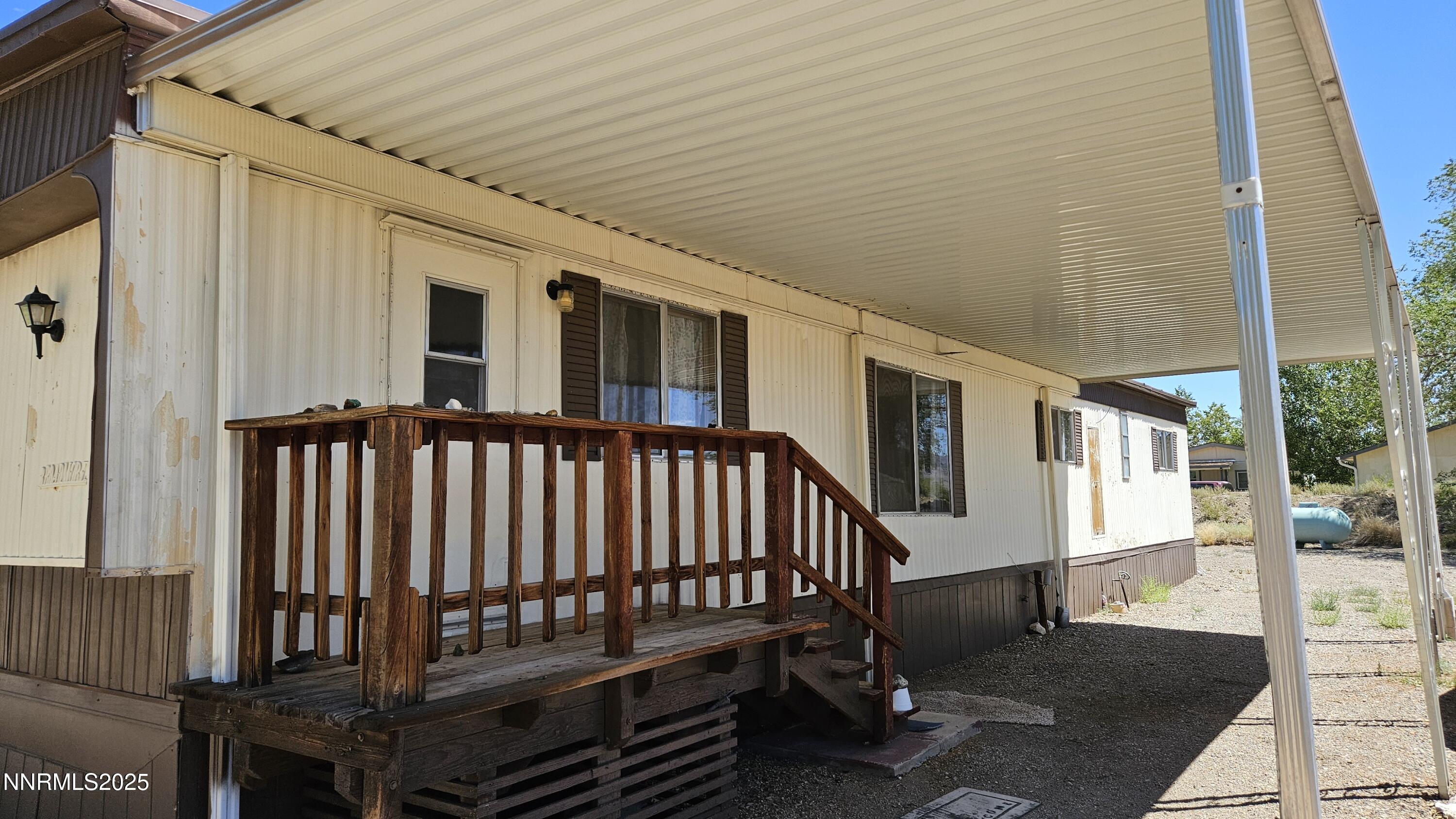 3791 Granite Way Topaz Ranch Estates, NV 89444 - Photo 36 of 39 a view of a porch with wooden floor