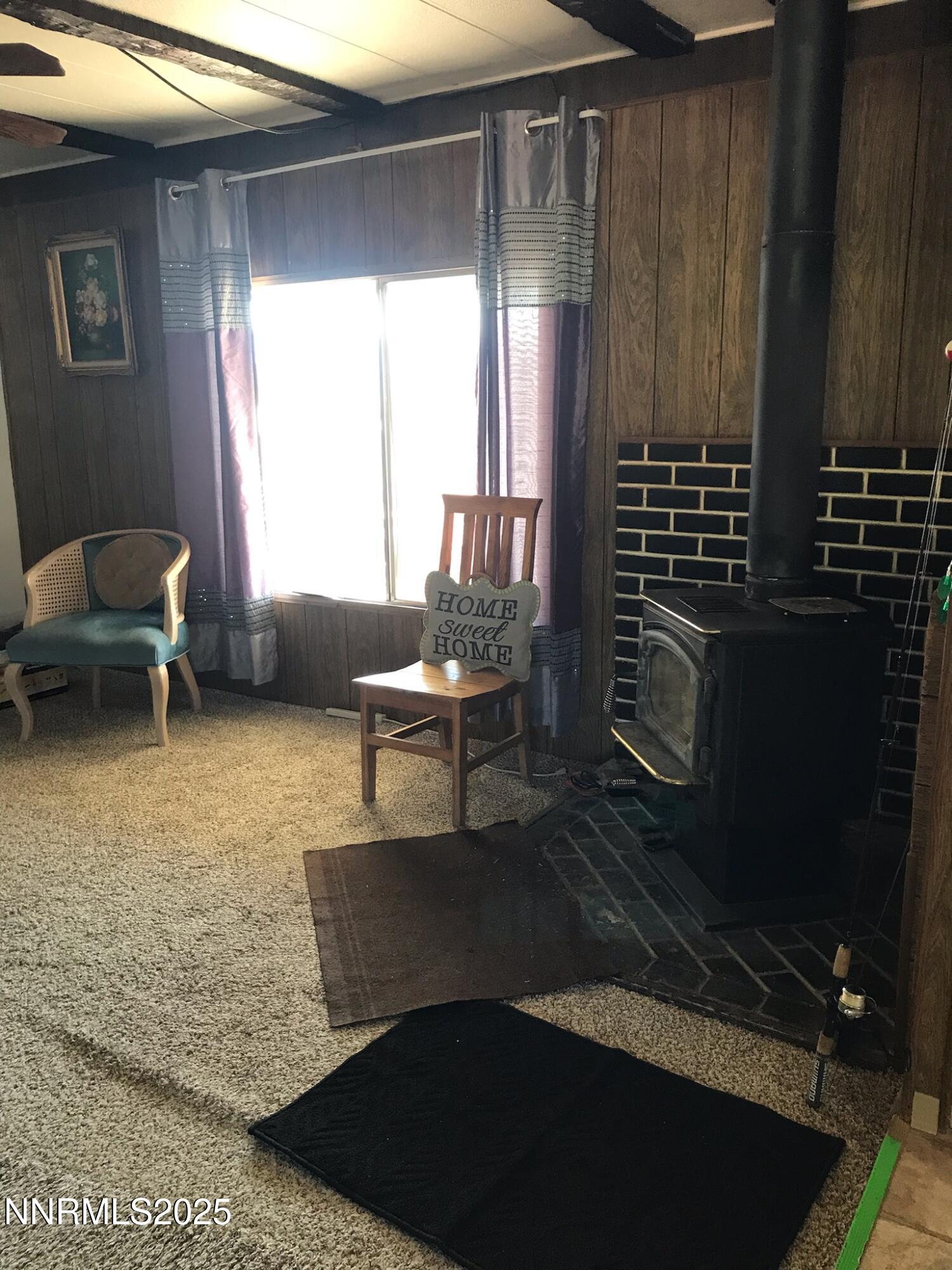 3791 Granite Way Topaz Ranch Estates, NV 89444 - Photo 9 of 39 a living room with furniture rug and window