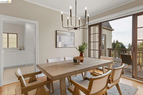 a kitchen with a stove a sink and a refrigerator