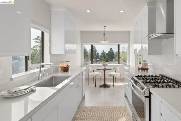 a view of a dining room with furniture window and outside view