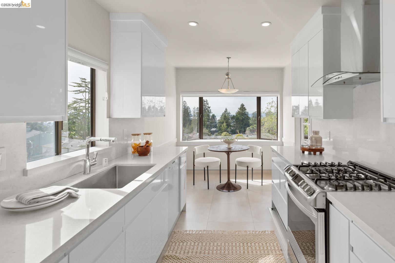 22 Windsor Avenue Kensington, CA 94708 - Photo 16 of 30 a kitchen with a stove a sink and a refrigerator