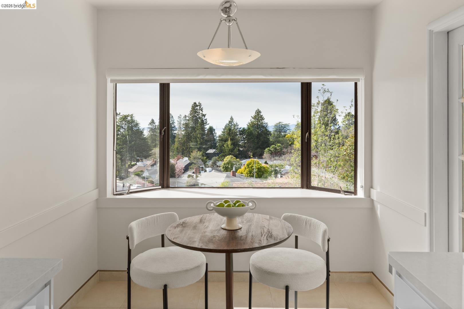 22 Windsor Avenue Kensington, CA 94708 - Photo 17 of 30 a view of a dining room with furniture window and outside view