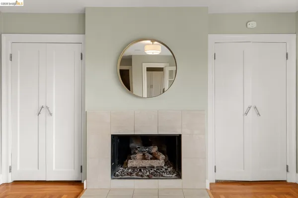 a bedroom with a bed and a potted plant