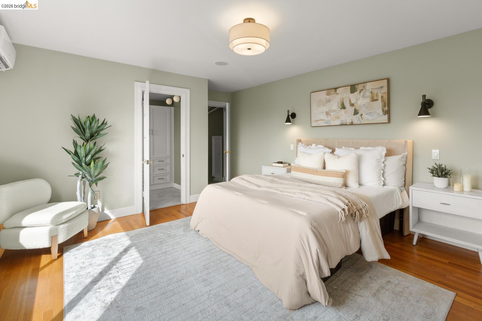 22 Windsor Avenue Kensington, CA 94708 - Photo 25 of 30 a bedroom with a bed and a potted plant