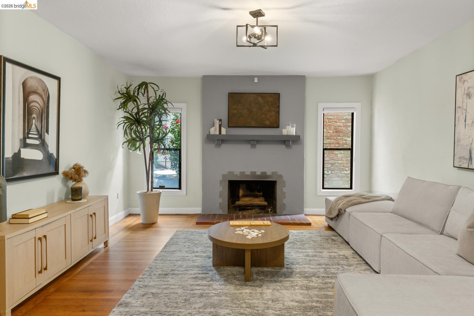 22 Windsor Avenue Kensington, CA 94708 - Photo 27 of 30 a living room with furniture and a fireplace