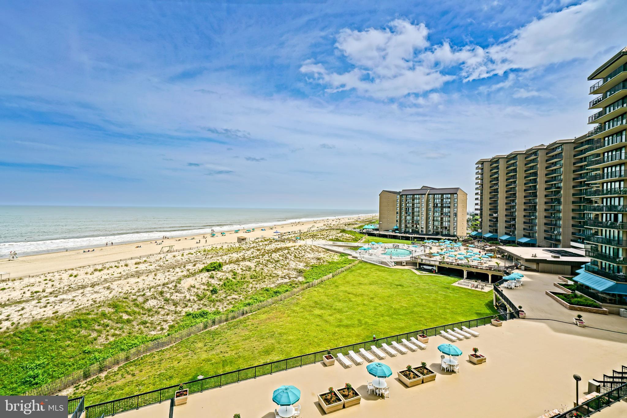 604 Dover House Road, Unit 604S Bethany Beach, DE 19930 - Photo 3 of 43 a view of a swimming pool with a yard