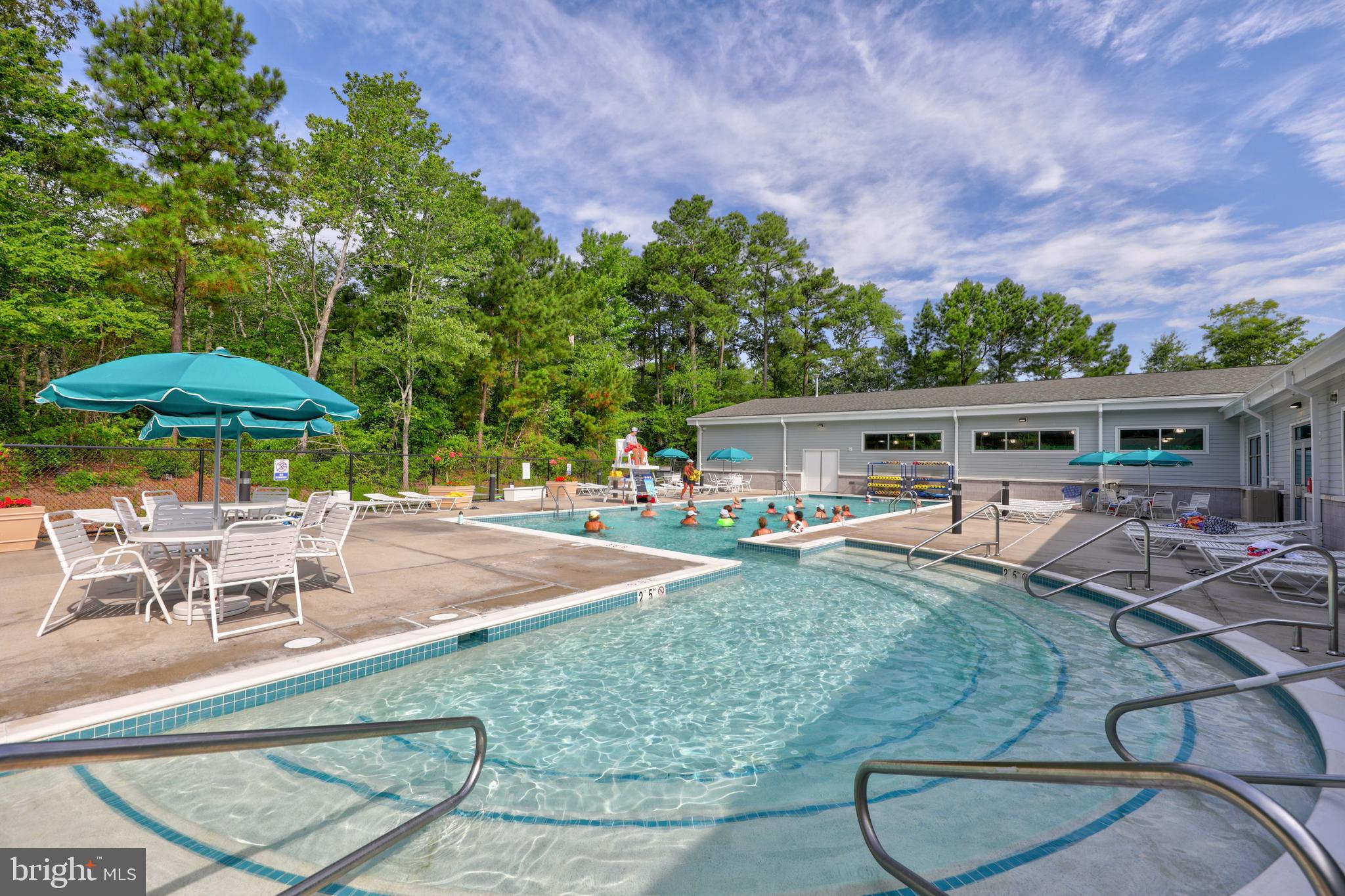 604 Dover House Road, Unit 604S Bethany Beach, DE 19930 - Photo 39 of 43 swimming pool view with a seating space